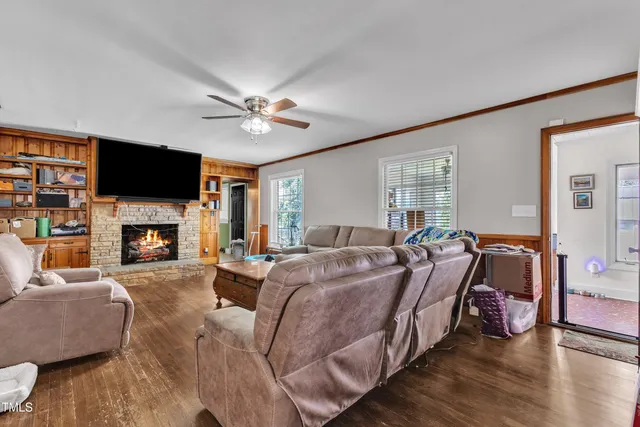 a kitchen with stainless steel appliances granite countertop a stove microwave and cabinets