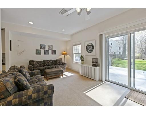 140 Cedar Street Lexington, MA 02421 - Photo 13 of 29 a living room with furniture and a floor to ceiling window