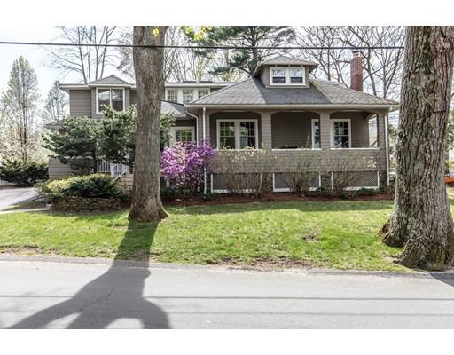 140 Cedar Street Lexington, MA 02421 - Photo 2 of 29 a front view of a house with a garden