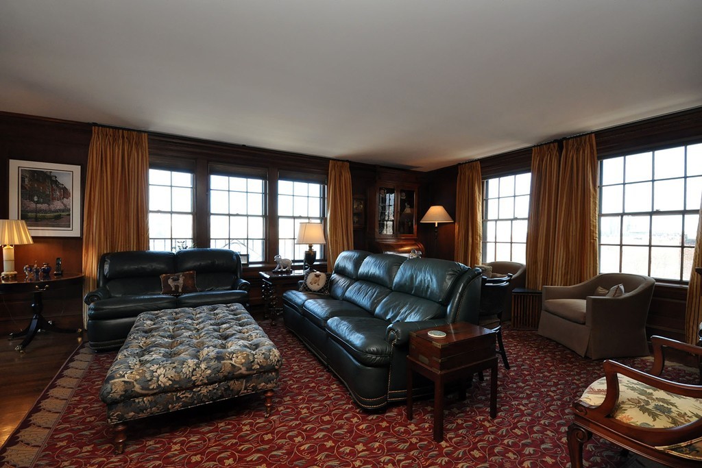 282 Beacon Street, Unit 7 Boston, MA 02116 - Photo 3 of 28 a living room with furniture flat screen tv and a large window
