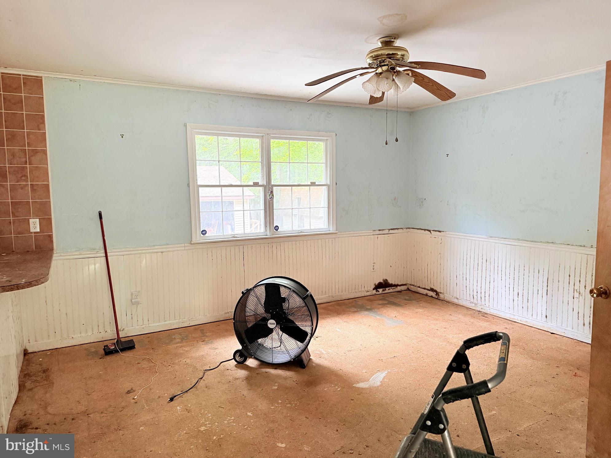 9532 Corkell Road Denton, MD 21629 - Photo 6 of 20 a view of a workspace with furniture and a window