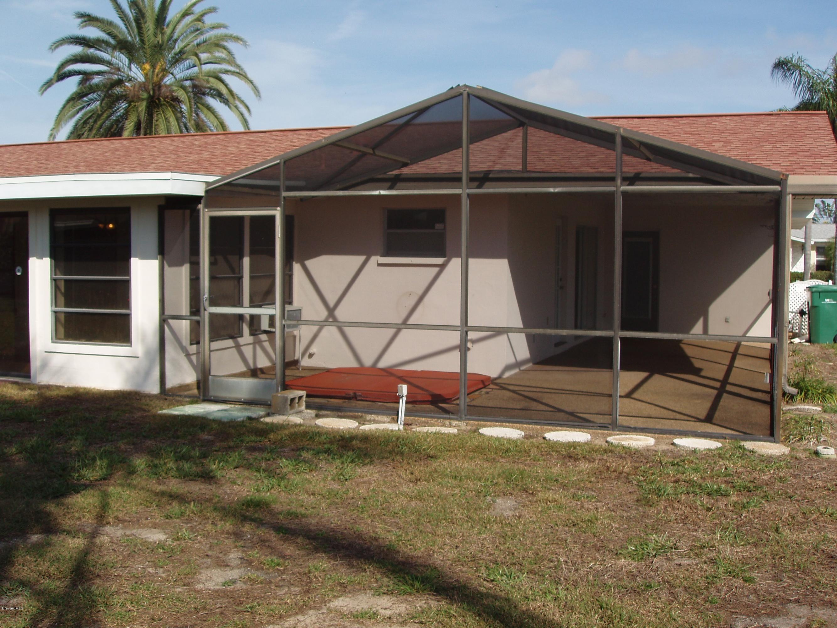 187 Sand Pine Road Indialantic, FL 32903 - Photo 23 of 29 Wrap Around Screen Porch
