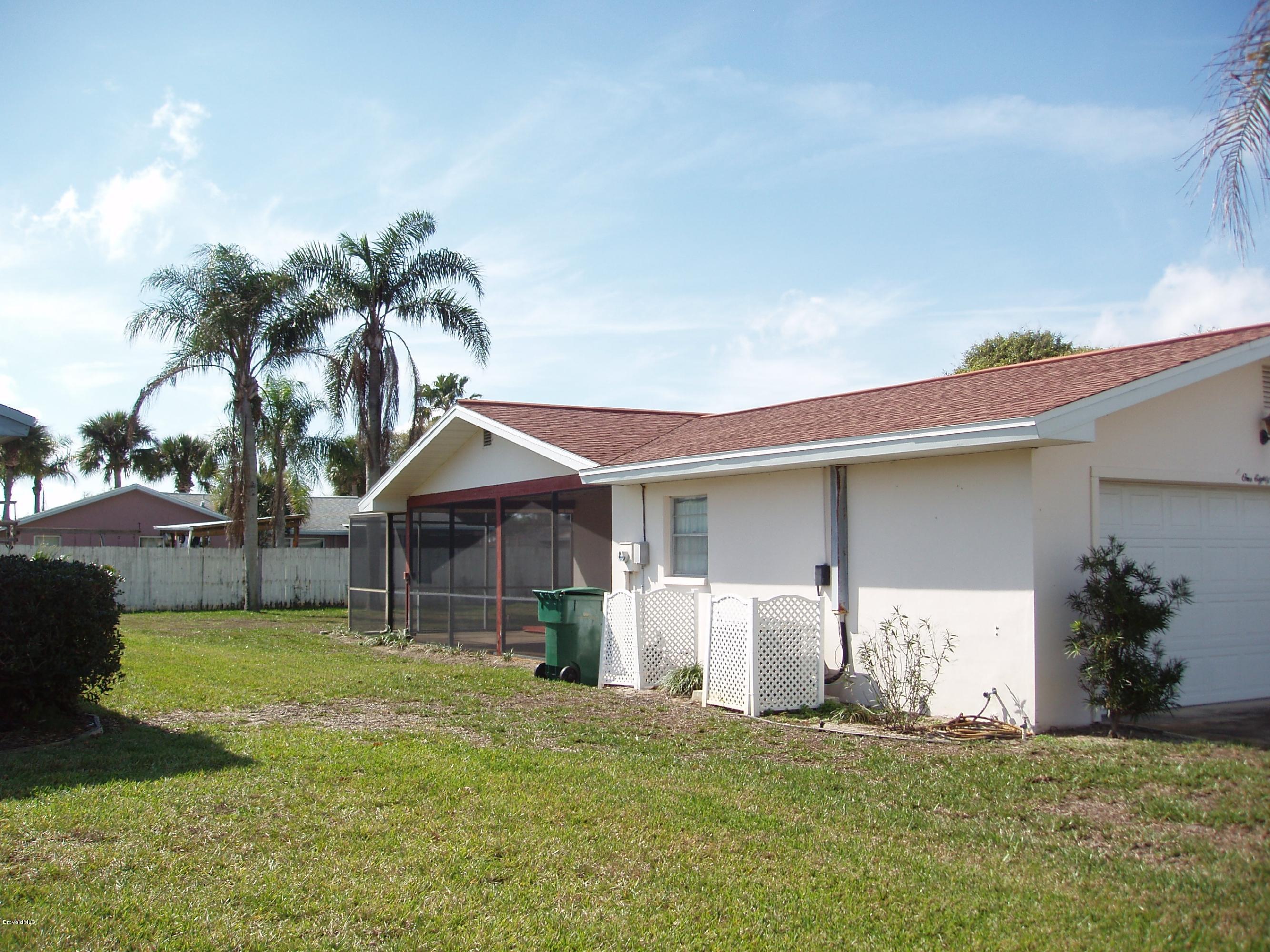 187 Sand Pine Road Indialantic, FL 32903 - Photo 24 of 29 East Side with Wrap Around Porch