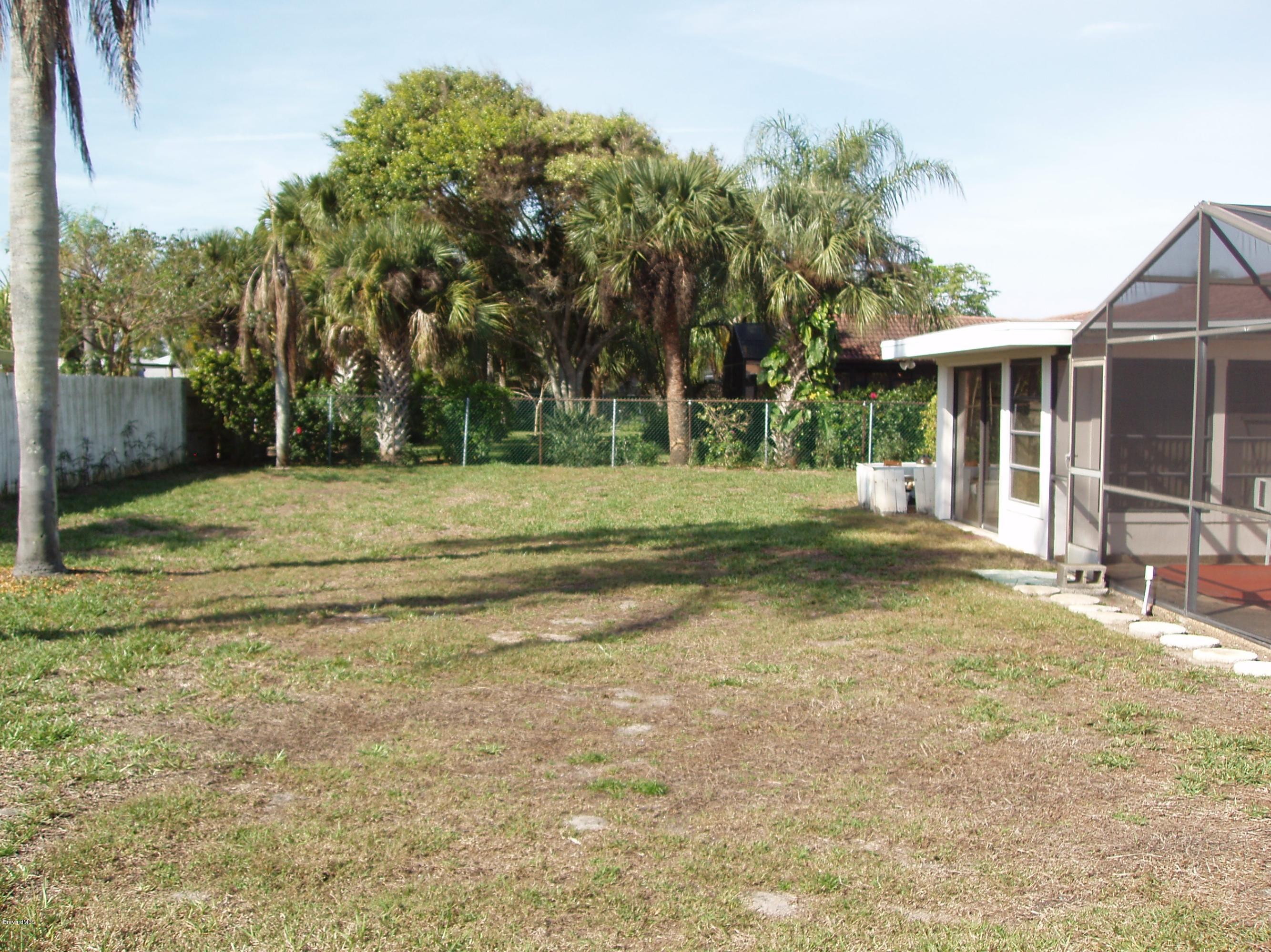 187 Sand Pine Road Indialantic, FL 32903 - Photo 27 of 29 Backyard & Back of House