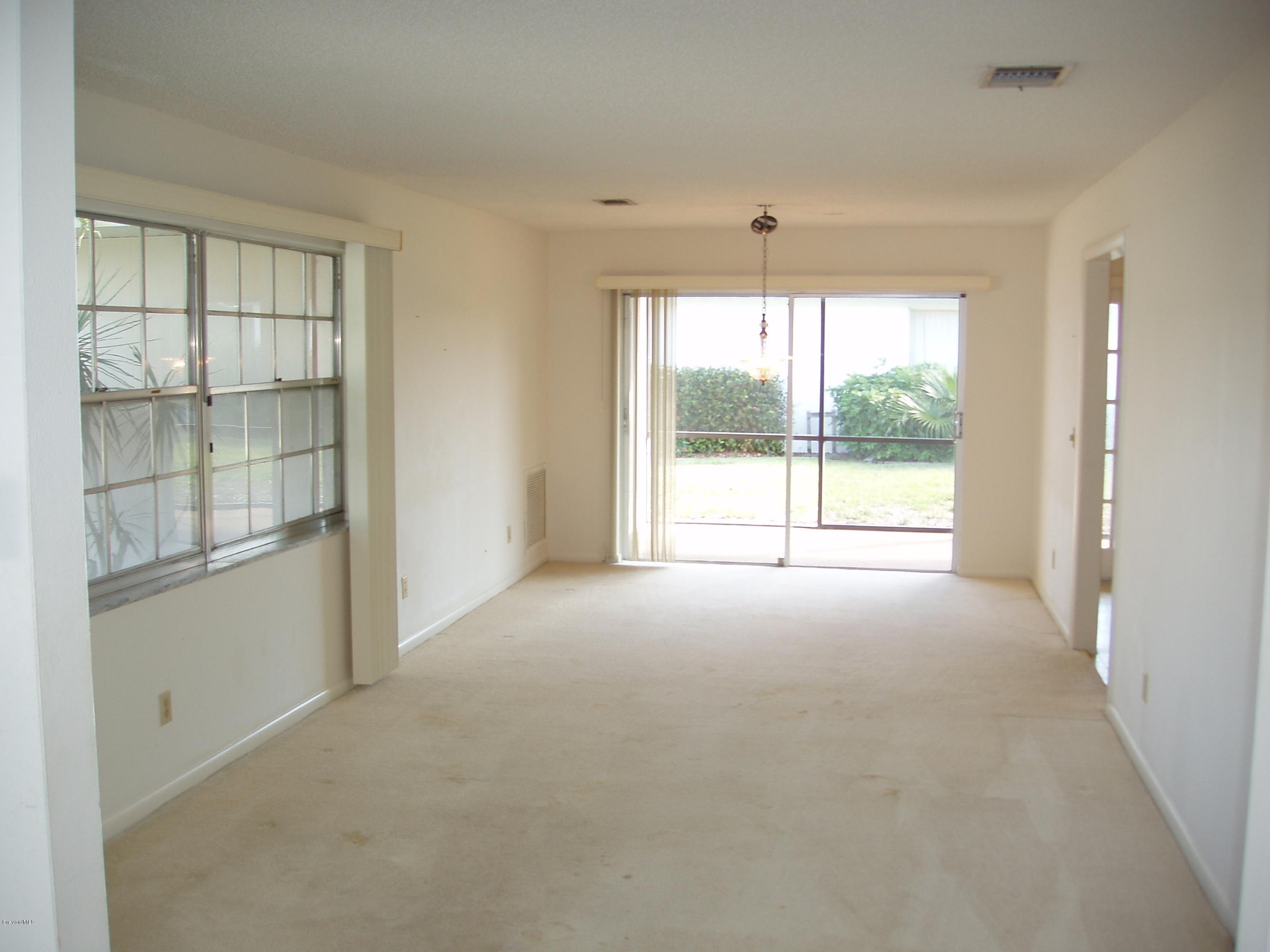 187 Sand Pine Road Indialantic, FL 32903 - Photo 4 of 29 Living & Dining Areas