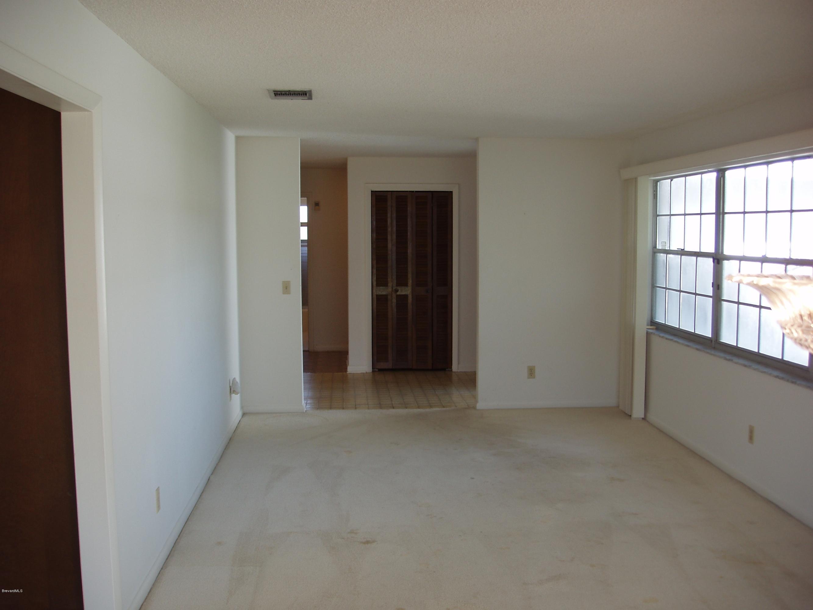 187 Sand Pine Road Indialantic, FL 32903 - Photo 5 of 29 Living Area to Foyer