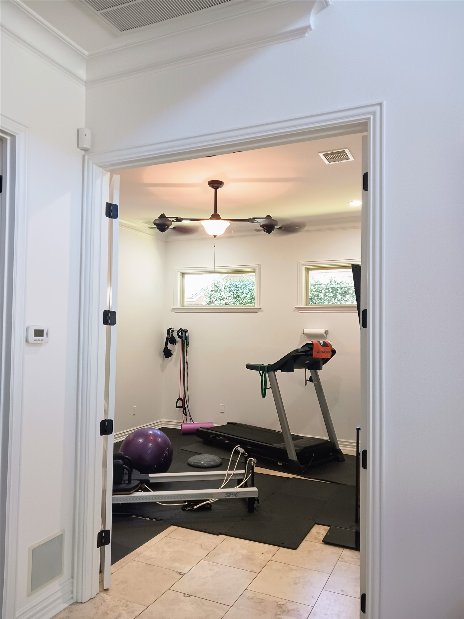424 West 32nd Street Houston, TX 77018 - Photo 13 of 50 Double doors at den/living space opens to excercise / media room option. Or even a 5th bedroom with simple closet addition.