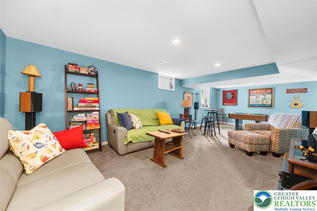 5616 Snowdrift Road Orefield, PA 18069 - Photo 26 of 36 A vibrant game room offers endless entertainment and a comfortable lounging area.