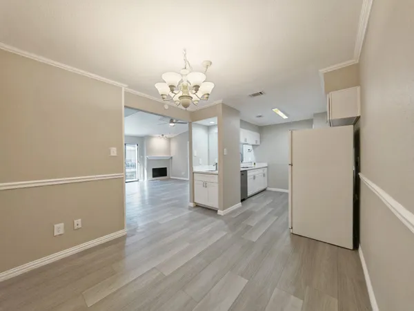 a large bathroom with a sink and a mirror