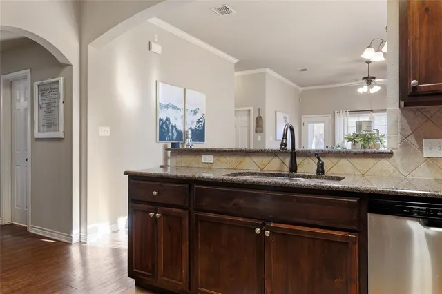 a bedroom with a bed and a table in it