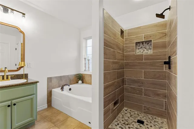 a bathroom with a shower and a bathtub