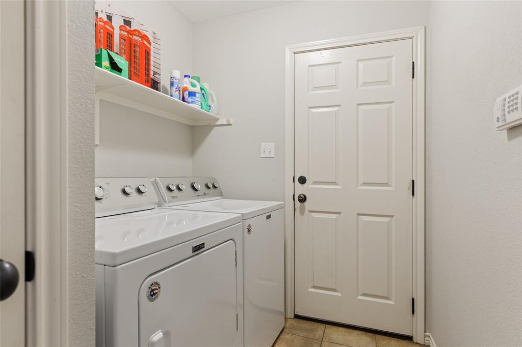 2565 Paddock Lane Robinson, TX 76706 - Photo 26 of 32 Washroom featuring light tile patterned floors and independent washer and dryer
