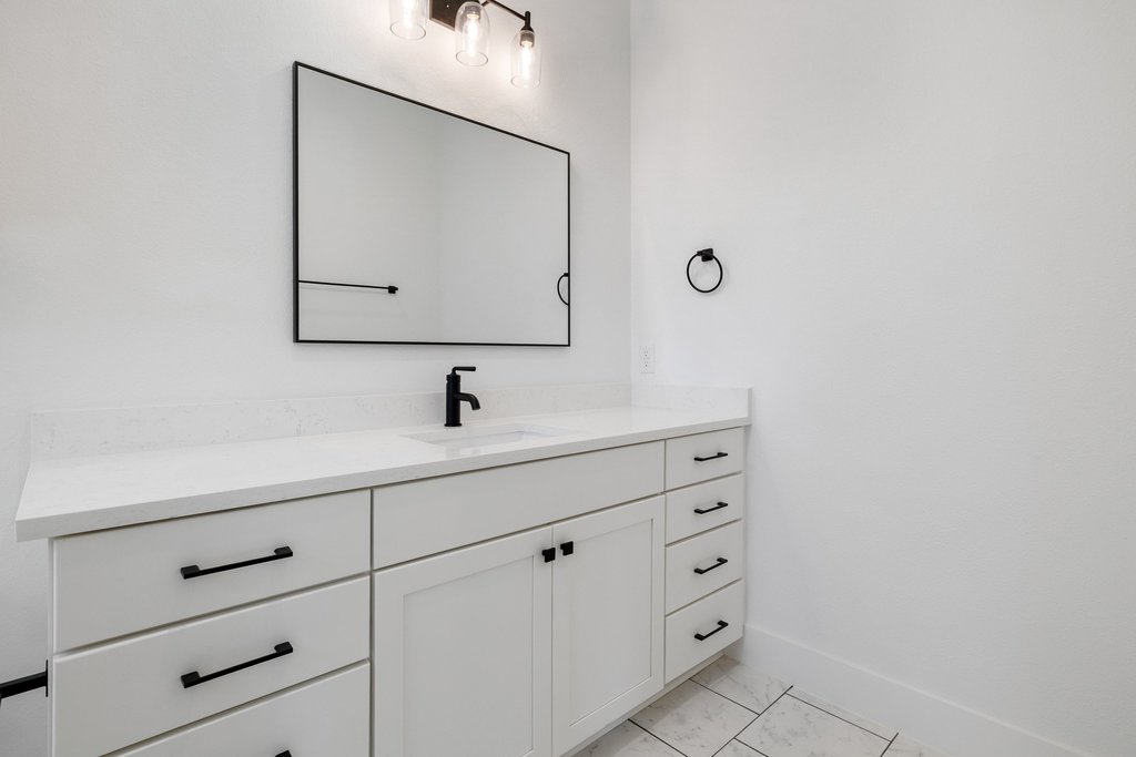 47 Peace Pipe Wimberley, TX 78676 - Photo 25 of 28 Bathroom featuring vanity and baseboards