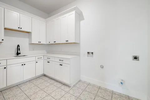 a view of cabinets and window