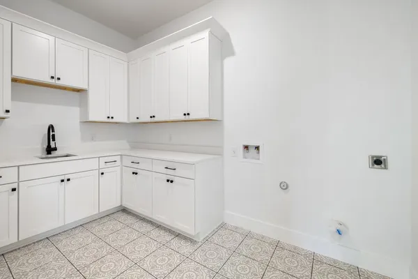 a view of cabinets and window