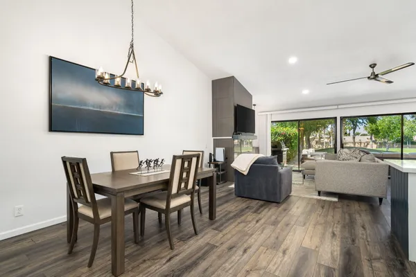a view of livingroom with furniture window and wooden floor