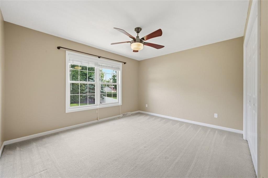 4003 Oak Point Circle McKees Rocks, PA 15136 - Photo 32 of 50 Bright and comfortable, this additional bedroom features clean lines, generous closet space, and an easy move-right-in presentation.