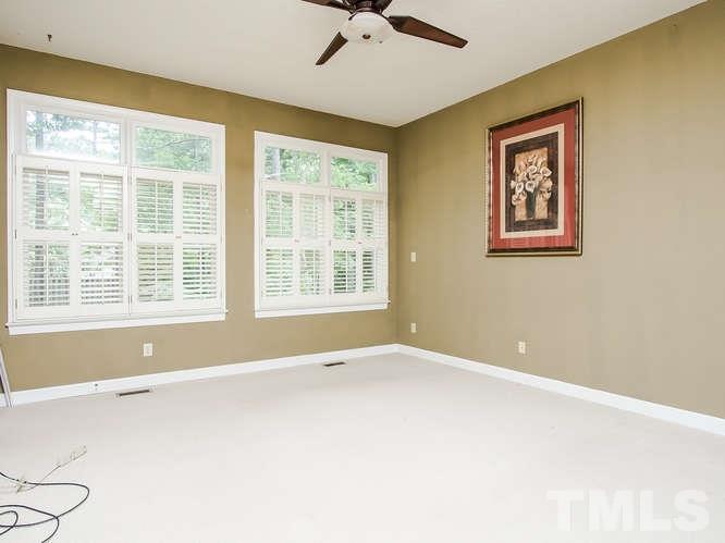 10128 Goodview Court Raleigh, NC 27613 - Photo 14 of 25 a view of an empty room with a window