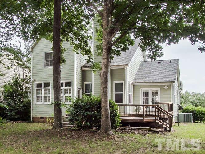 10128 Goodview Court Raleigh, NC 27613 - Photo 22 of 25 front view of a house with a yard