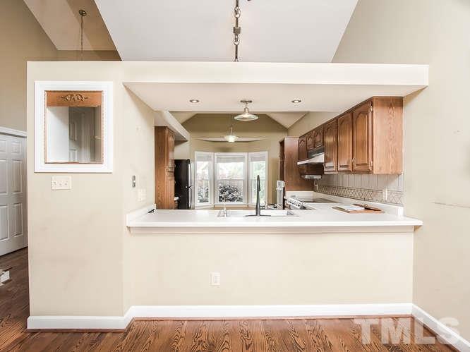 10128 Goodview Court Raleigh, NC 27613 - Photo 8 of 25 a view of kitchen with wooden floor