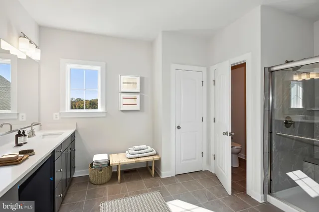 a reading room with furniture and a window