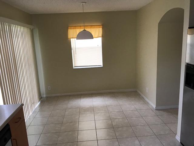 748 Imperial Lake Road West Palm Beach, FL 33413 - Photo 7 of 16 IMG_5399