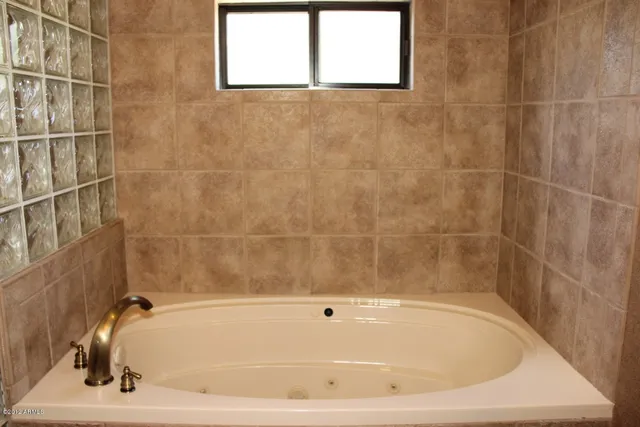 a bathroom with a bathtub