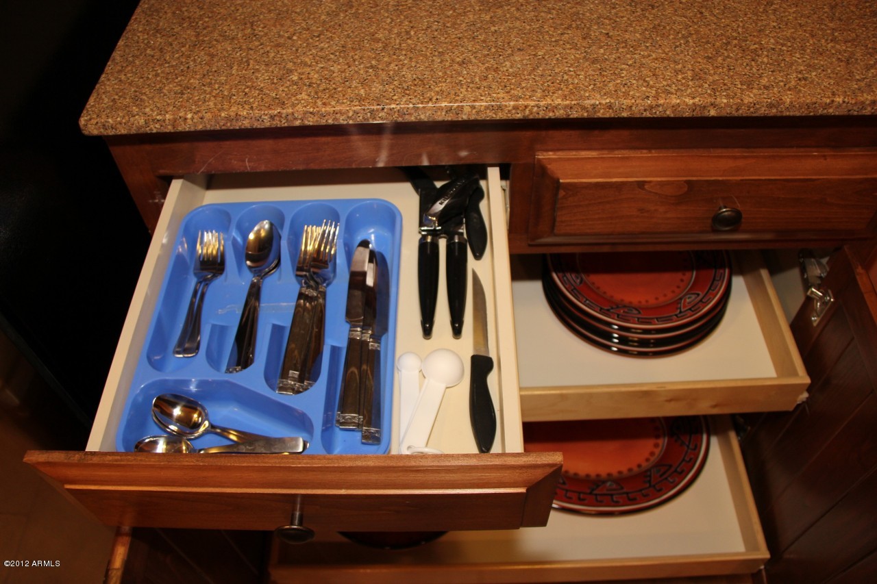 36601 North Mule Train Road, Unit 8A Carefree, AZ 85377 - Photo 29 of 50 a living room with furniture and a wooden floor