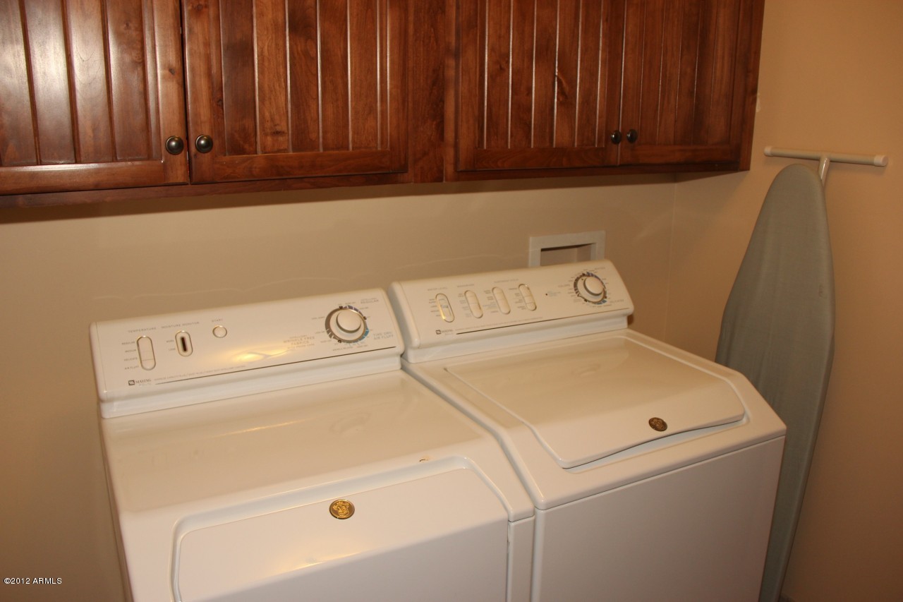 36601 North Mule Train Road, Unit 8A Carefree, AZ 85377 - Photo 31 of 50 a utility room with dryer and washer