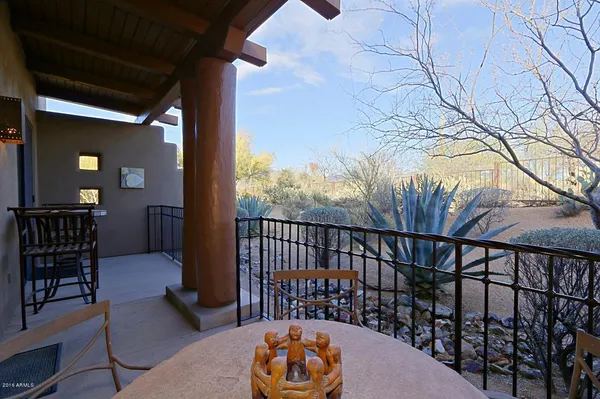 a view of balcony door and dining area