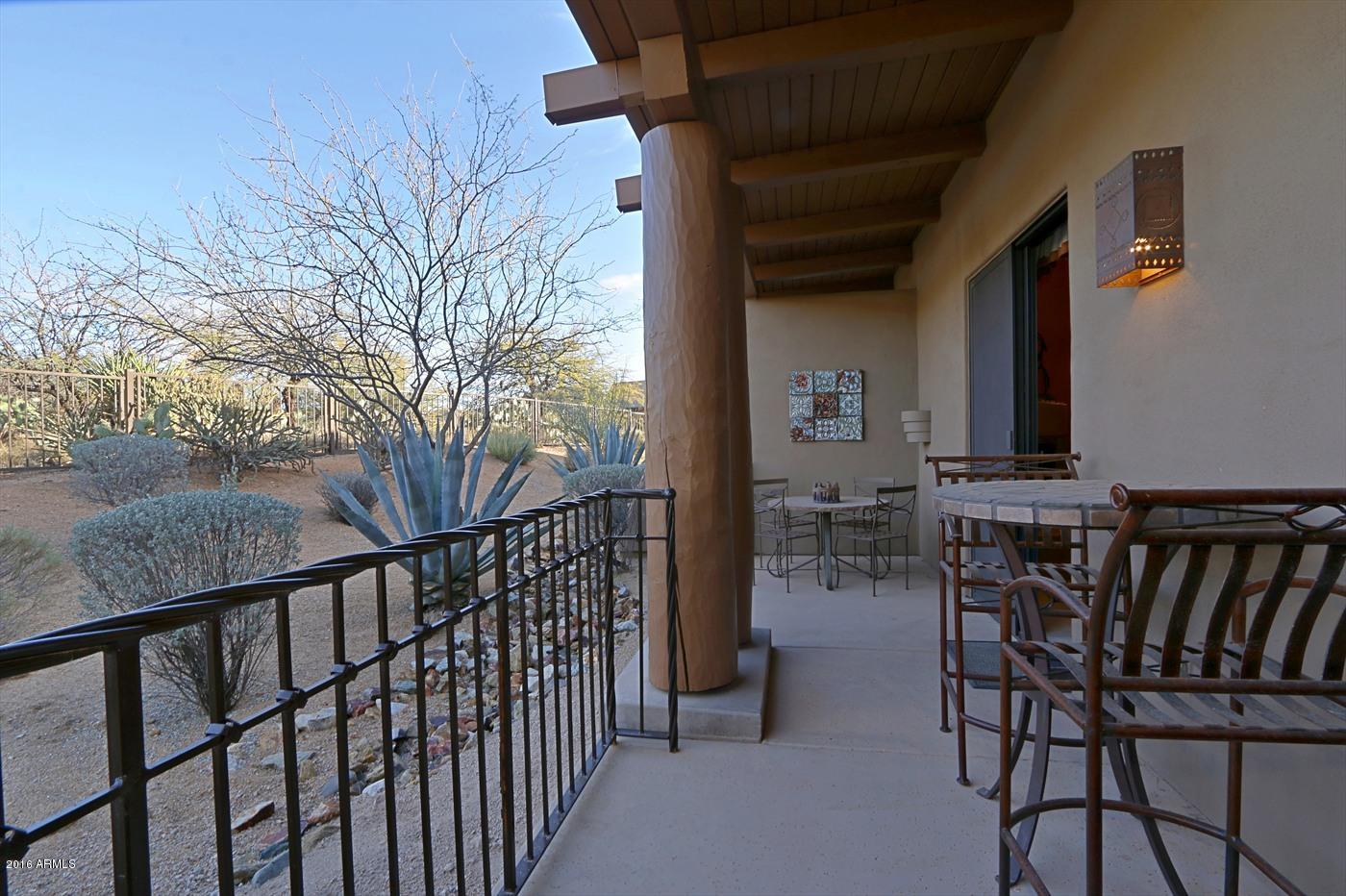 36601 North Mule Train Road, Unit 8A Carefree, AZ 85377 - Photo 36 of 50 a view of a balcony with chairs