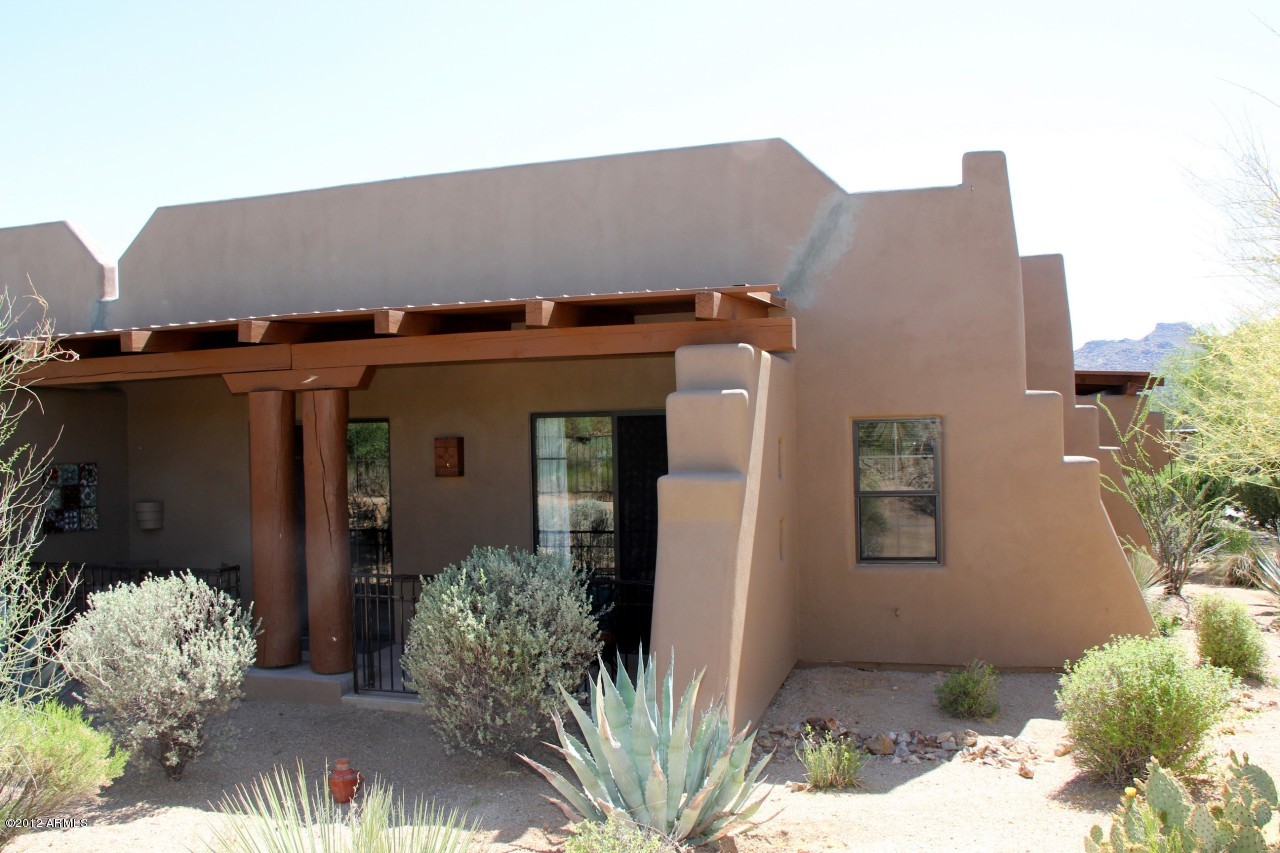 36601 North Mule Train Road, Unit 8A Carefree, AZ 85377 - Photo 37 of 50 a view of a house with potted plants