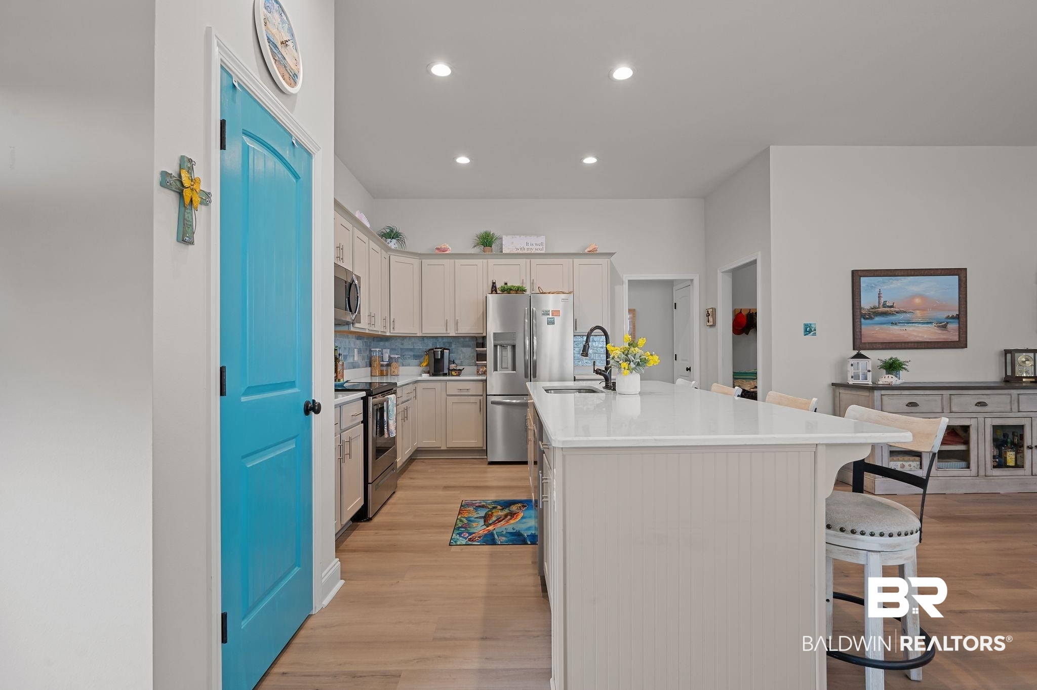 1165 Stella Road Foley, AL 36535 - Photo 12 of 42 Kitchen with stainless steel appliances, light wood-style flooring, recessed lighting, a sink, and an island with sink