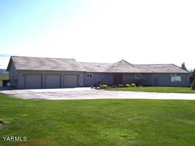 12216 West Barrett Road Yakima, WA 98908 - Photo 4 of 21 a house view with a outdoor space