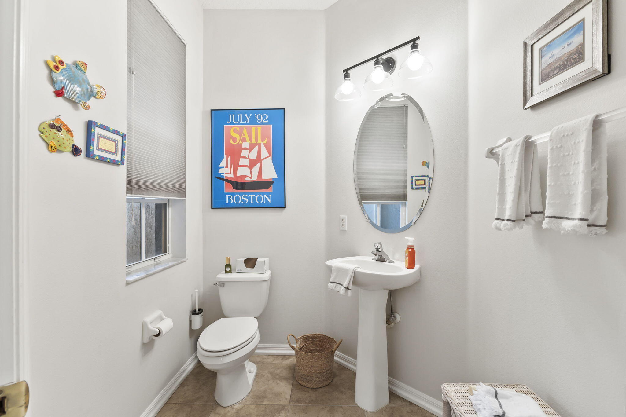 1604 Southwest Harbour Isles Circle, Unit 82 Port St. Lucie, FL 34986 - Photo 24 of 38 a bathroom with a toilet a sink and mirror