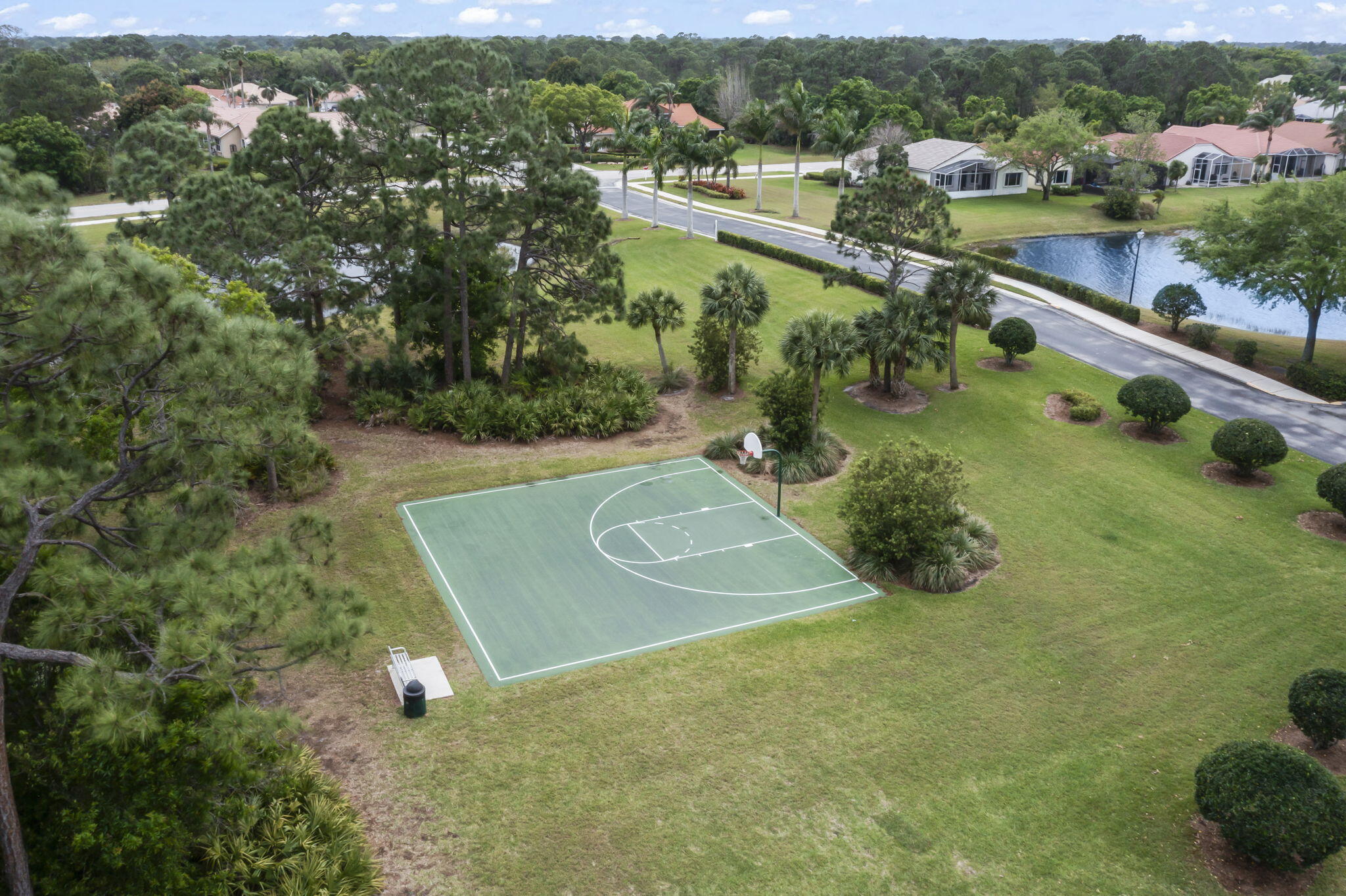 1604 Southwest Harbour Isles Circle, Unit 82 Port St. Lucie, FL 34986 - Photo 35 of 38 an aerial view of a residential houses with outdoor space and city view
