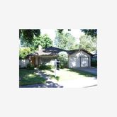 a outdoor space of a house with a yard