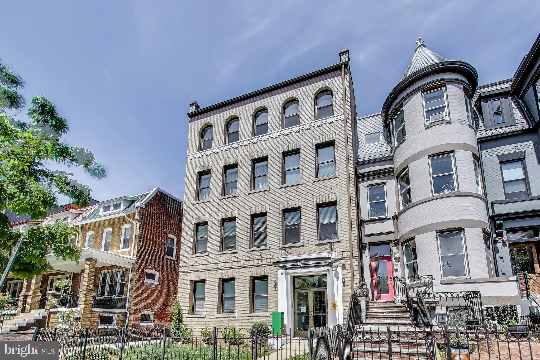 1461 Girard Street Northwest, Unit 400 Washington, DC 20009 - Photo 1 of 13 a front view of a multi story building
