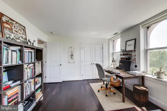 a view of a workspace with furniture and toys