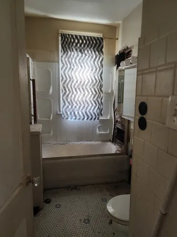 a view of a room with a fan