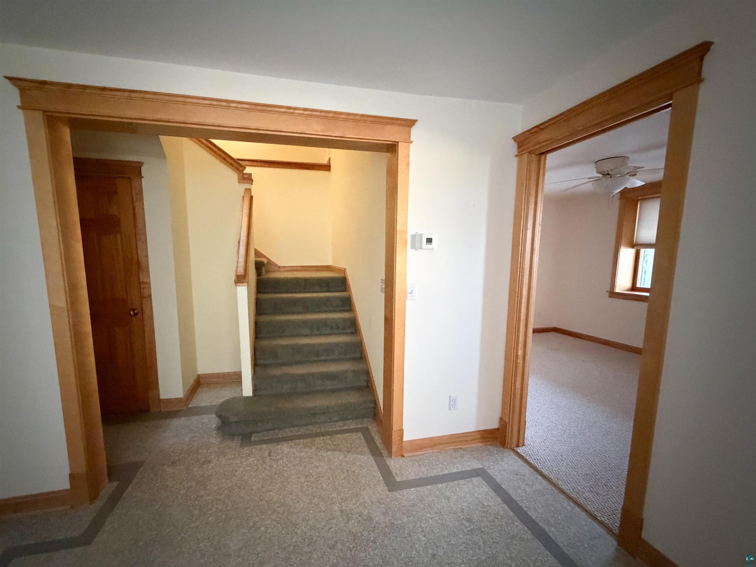 13 West 8th Street Duluth, MN 55806 - Photo 39 of 57 Inviting interior entry featuring neutral wall tones and light wood trim throughout