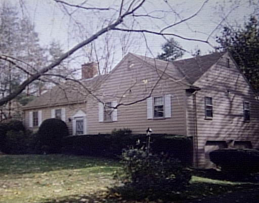 39 Griscom Road Sudbury, MA 01776 - Photo 1 of 1 a view of a house with a yard