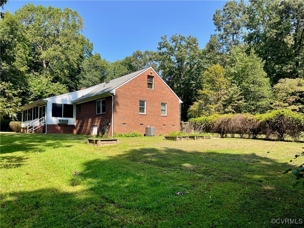9611 Old Forge Road Providence Forge, VA 23140 - Photo 11 of 38 a front view of house with yard and green space