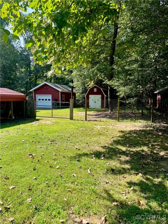 9611 Old Forge Road Providence Forge, VA 23140 - Photo 16 of 38 a view of a house with pool and a yard