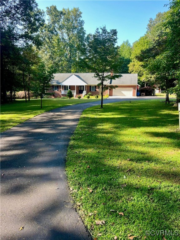 9611 Old Forge Road Providence Forge, VA 23140 - Photo 3 of 38 a view of a house with a big yard