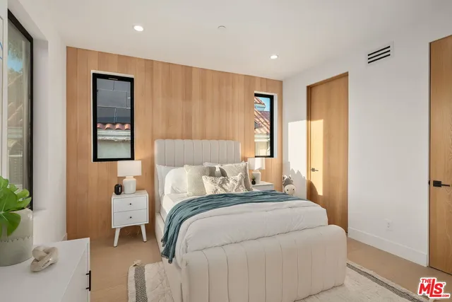 a view of a hallway with a livingroom and a dinning room