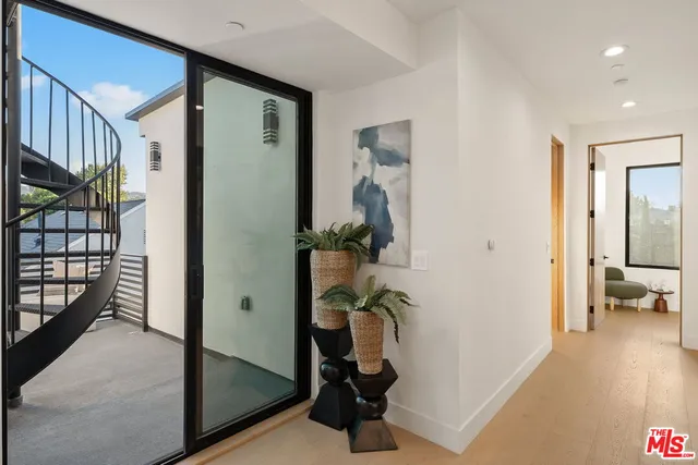 a view of balcony with furniture