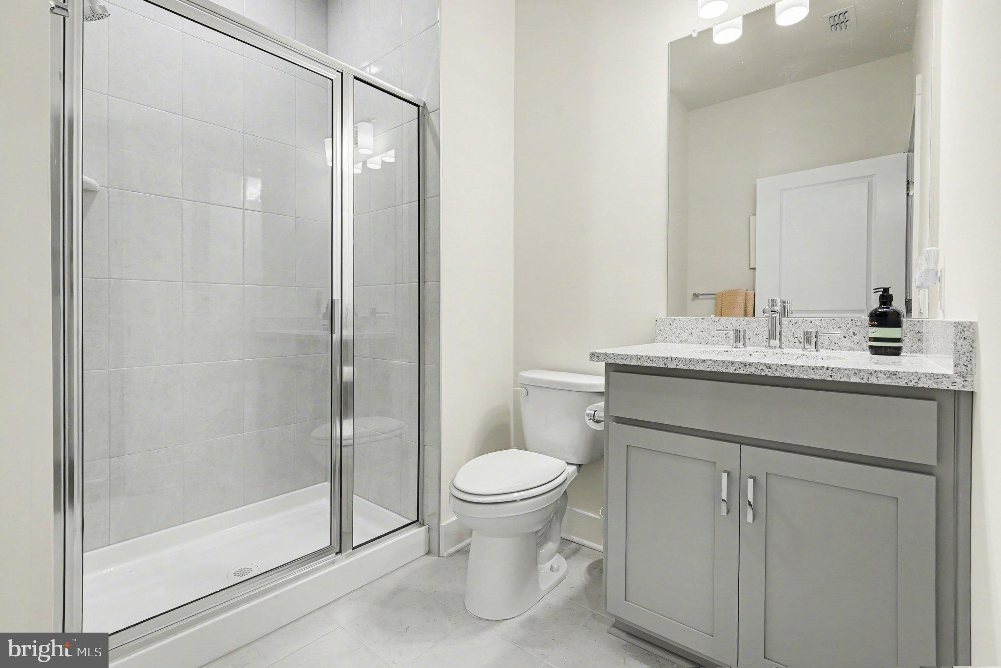 1212 Wright Street Hatfield, PA 19440 - Photo 16 of 39 a bathroom with a sink toilet and shower