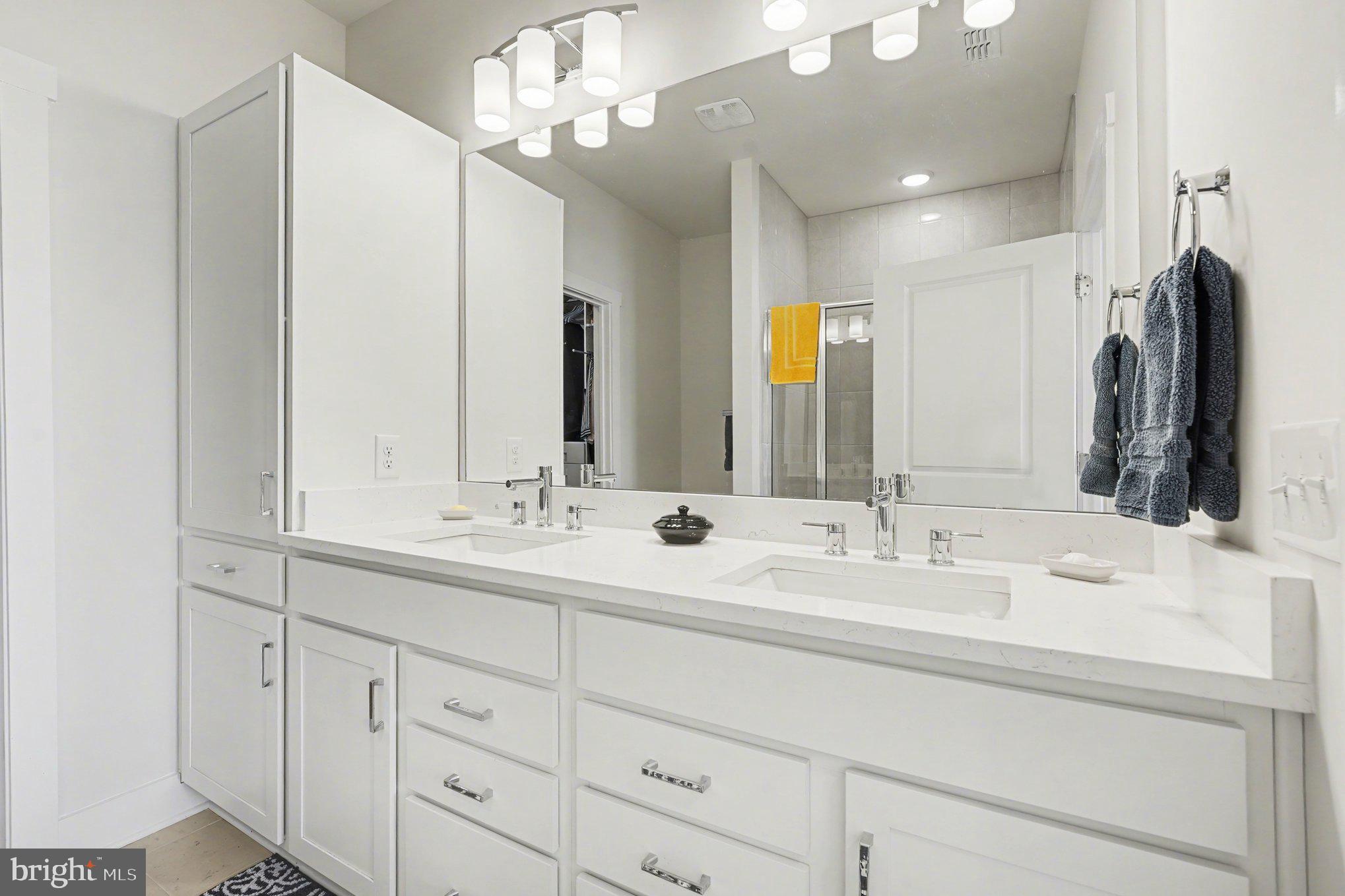 1212 Wright Street Hatfield, PA 19440 - Photo 21 of 39 a bathroom with double vanity sinks a vanity and a shower