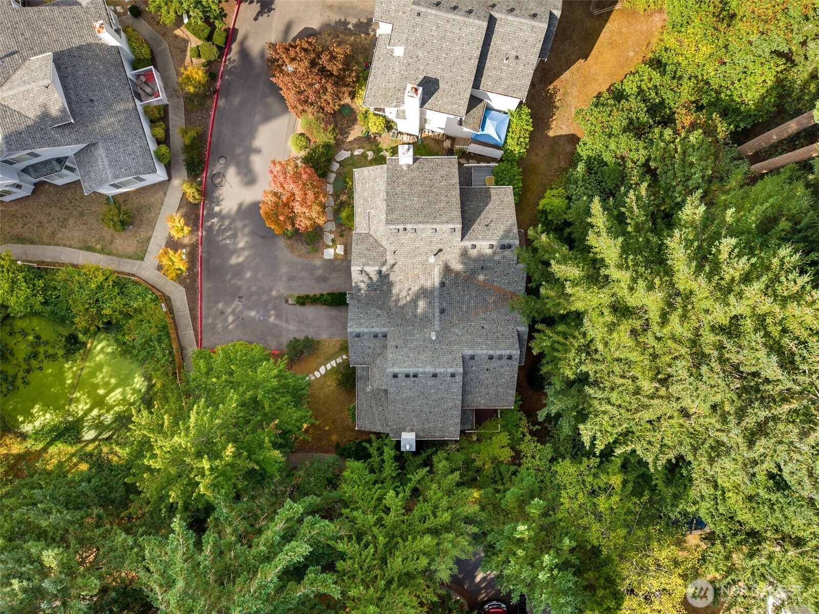 4748 Lakeshore Lane Southeast, Unit B Olympia, WA 98513 - Photo 25 of 31 an aerial view of a house with a yard